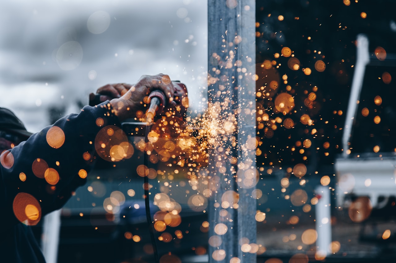 Sparks fly during industrial metal fabrication work